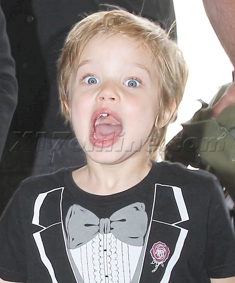 sunglasses Angelina Jolie braids Zahara Shiloh lax car trench khakis tuxedo tee shirt