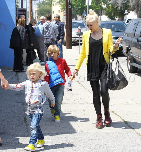 Gwen Stefani blonde yellow zuma kingston birthday leather pants doc martins bun present face paint