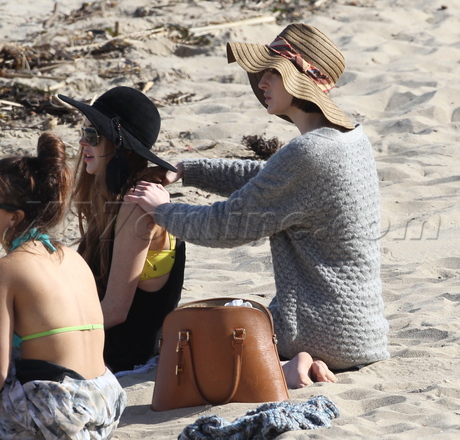 Lindsay Lohan ali lohan shorts hat sunglasses smoking cigarette massage beach