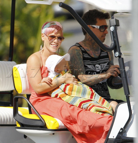 Carey Hart Pink golf cart pink hair sunglasses tattoo willow 
