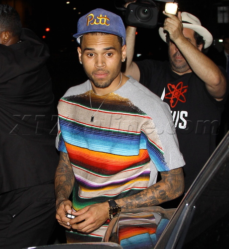 Chris Brown stripes boa steakhouse hollywood rihanna hat singer 