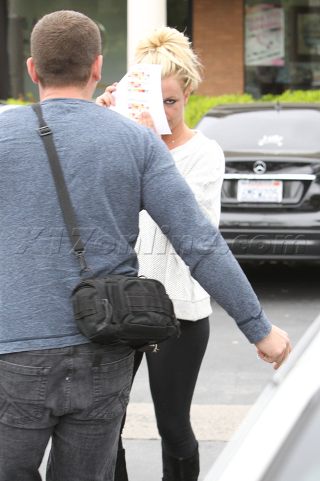 Britney Spears boots tights car shots