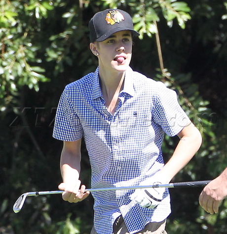Justin Bieber golf hat golf cart put green plaid tattoo 