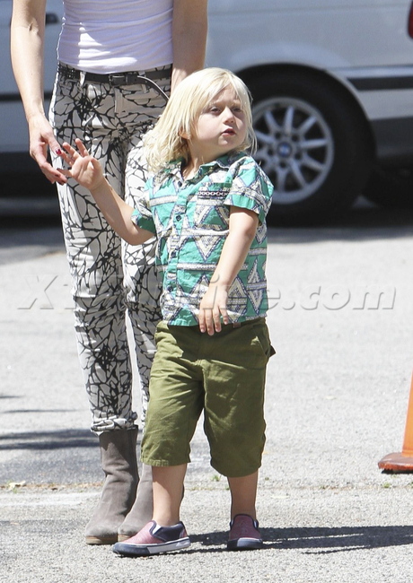 Gwen Stefani  tank top zuma print jeans boots 