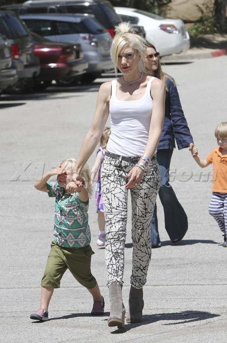 Gwen Stefani  tank top zuma print jeans boots 