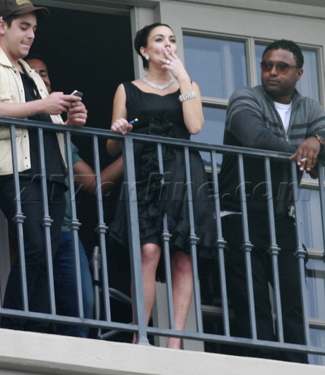 Lindsay Lohan marina del rey smoking liz & dick balcony 