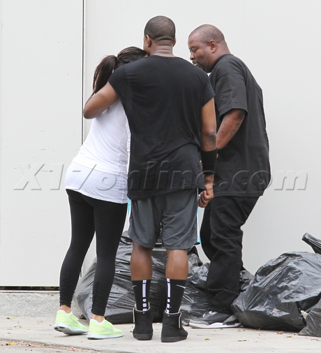 rapper kim kardashian gym workout tights spandex hug couple reality tv