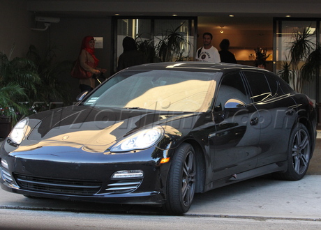 Lindsay Lohan sunglasses dress car Porsche  heels chanel 
