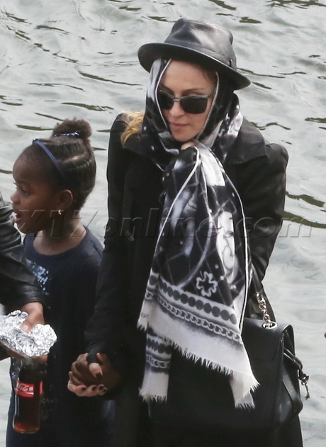 Madonna boat children singer blonde sunglasses jacket