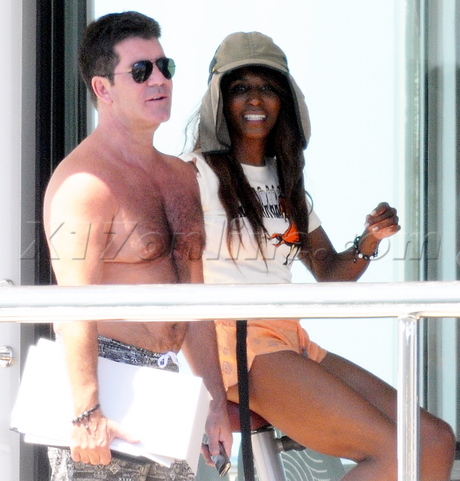 Simon Cowell shirtless american idol x factor sunglasses saint tropez france hairy chest sinitta butt legs shorts hat cowboy hat 