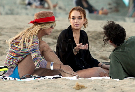Lindsay Lohan dina lohan hat cigarette ocean beach family