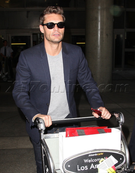 sunglasses Ryan Seacrest lax airport blazer american idol
