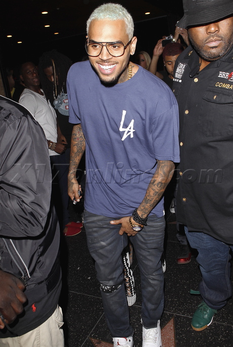 Chris Brown tattoo singer blonde glasses rihanna