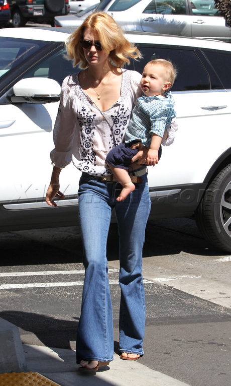 January Jones  jeans baby whole foods groceries 