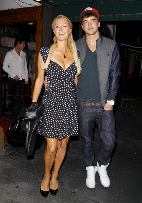 dress polka dots blonde hollywood model jacket hat legs tan cleavage 