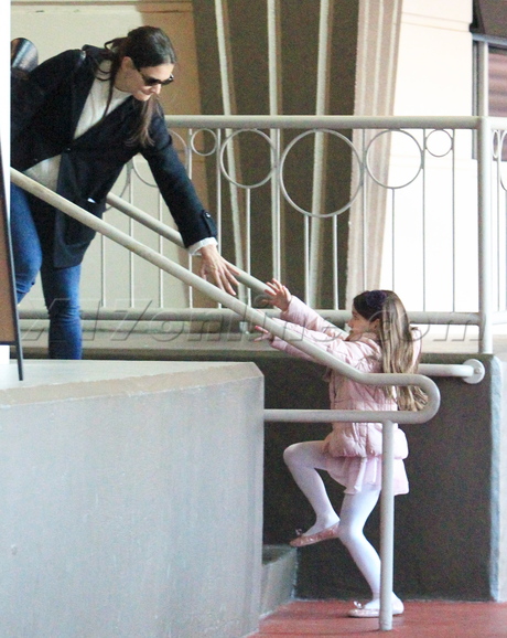 Katie Holmes New York City Suri jacket bowing tights 