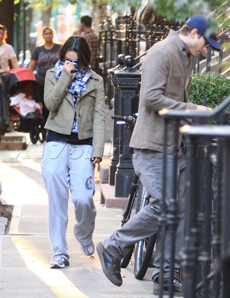 Mila Kunis  Ashton Kutcher hiding sweats scarf blazer sunglasses 