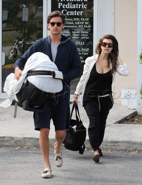 sunglasses shorts Kourtney Kardashian Scott Disick reality tv filming miami florida penelope baby infant newborn Aventura Pediatric Center 