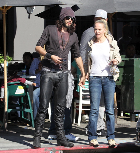 Russell Brand leather pants filming brand x hat 