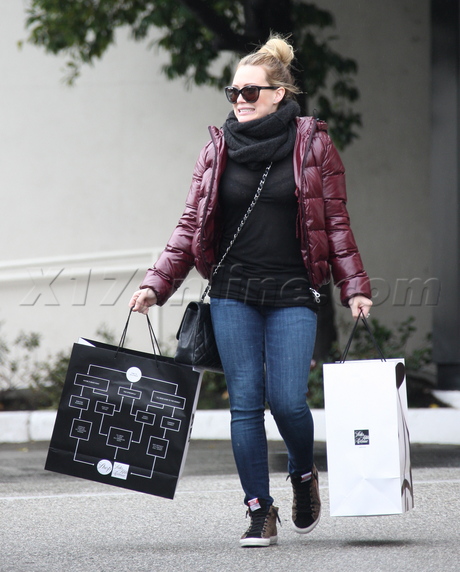 Hilary Duff alone puffer jacket chanel sunglasses 