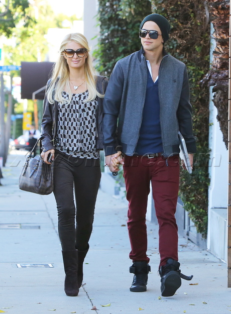 Paris Hilton  River Viiperi  sunglasses holding hands salon heels boots leather jacket 