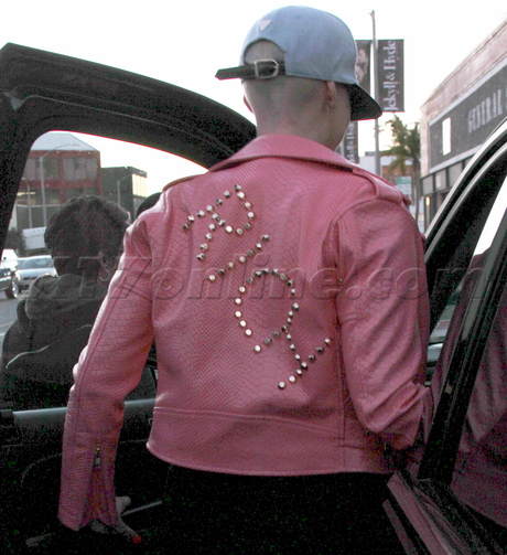 pregnant spandex Amber Rose leather jacket car shorts junk food 
