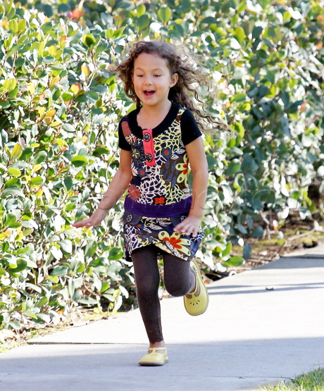 Halle Berry boots jeans sunglasses running nahla hat scarf 