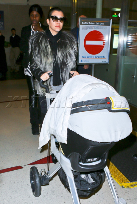 Kourtney Kardashian airport lax baby realty tv sunglasses reality tv 