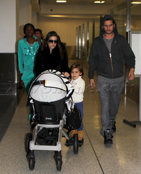 kourtney kardashian scott disick hoody son mason lax airport 