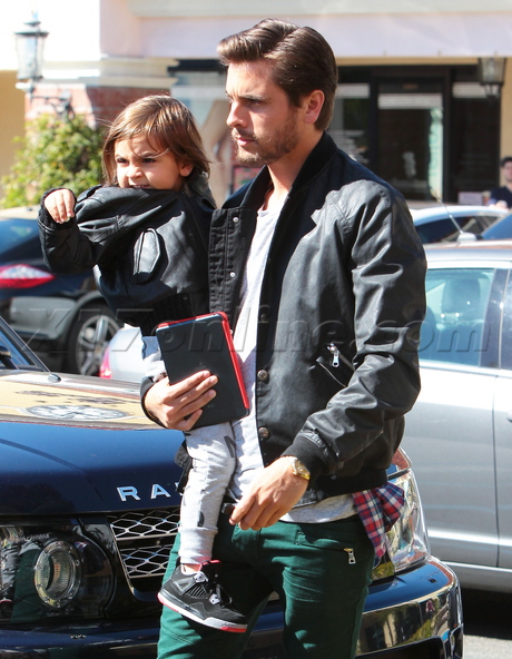 Scott Disick  kortney kardashian leather mason disick green jeans 