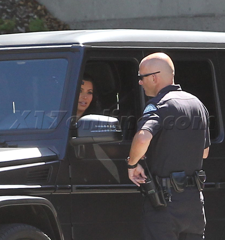 Kim Kardashian cops police pulled over stopped infraction traffic traffic ticket speeding ticket Keeping Up With the Kardashians pregnant Kanye West reality TV