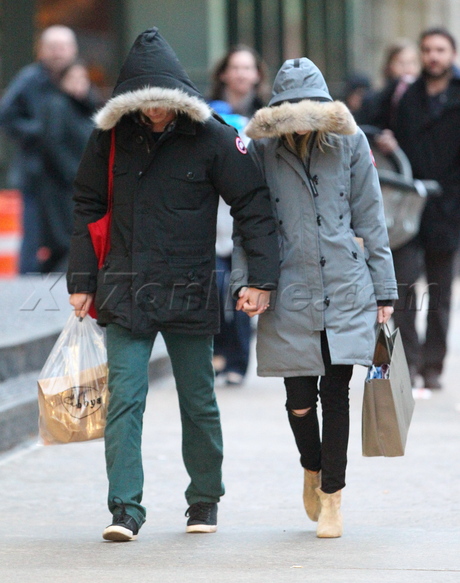 Emma Stone Andrew Garfield jacket hat holding hands