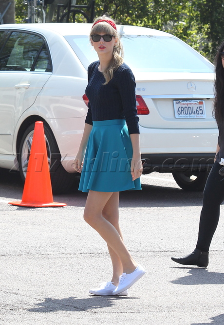 Taylor Swift  filming skirt esquire sweater change clothes 