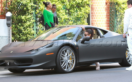 Christina Milian Ferrari boots print tops mr chow sunga sses