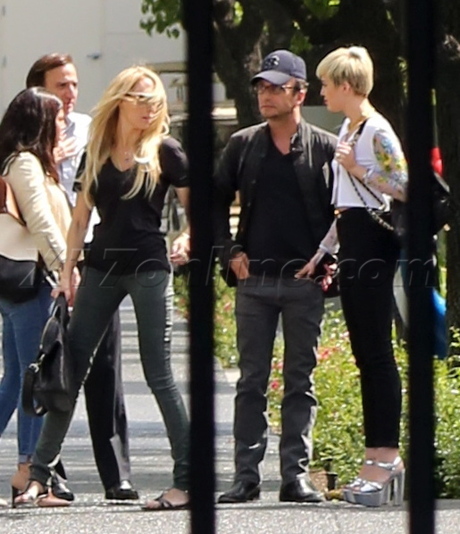 Miley Cyrus heels jeans studio short hair Larry Rudolph britney spears