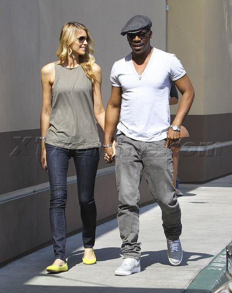 Eddie Murphy Paige Butcher Beverly Hills derby cap