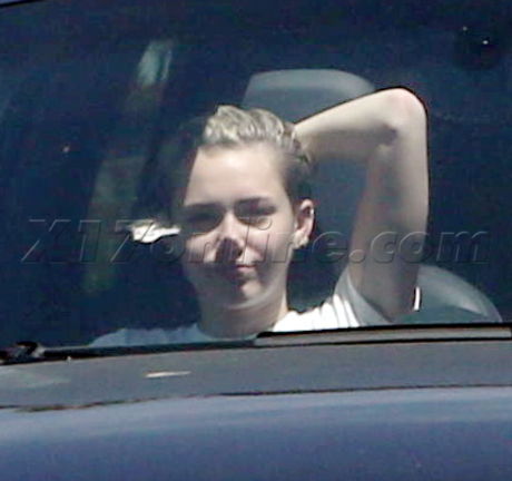 Miley Cyrus porsche car shots no make up no seat belt 