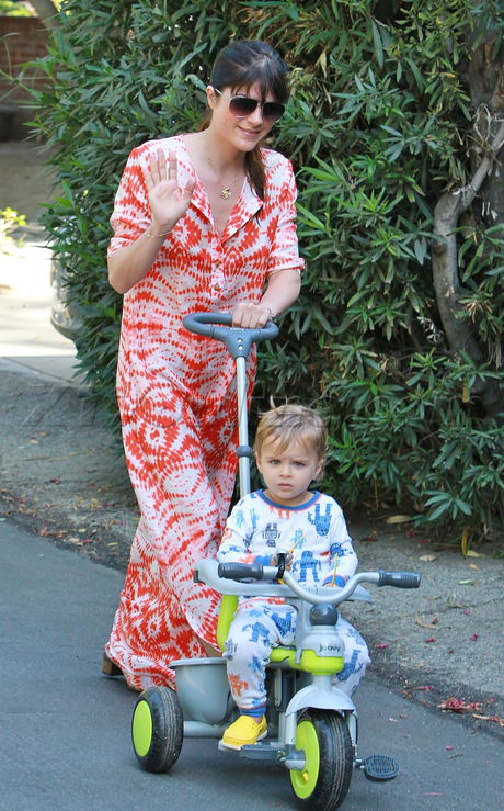 Selma Blair dress sunglasses play fun baby cute wave