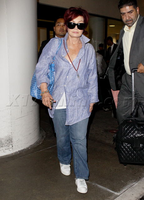 Sharon Osbourne lax airport sunglasses button up denim mom jeans x factor 