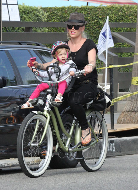 venice Carey Hart pink hat sunglasses bike ride 