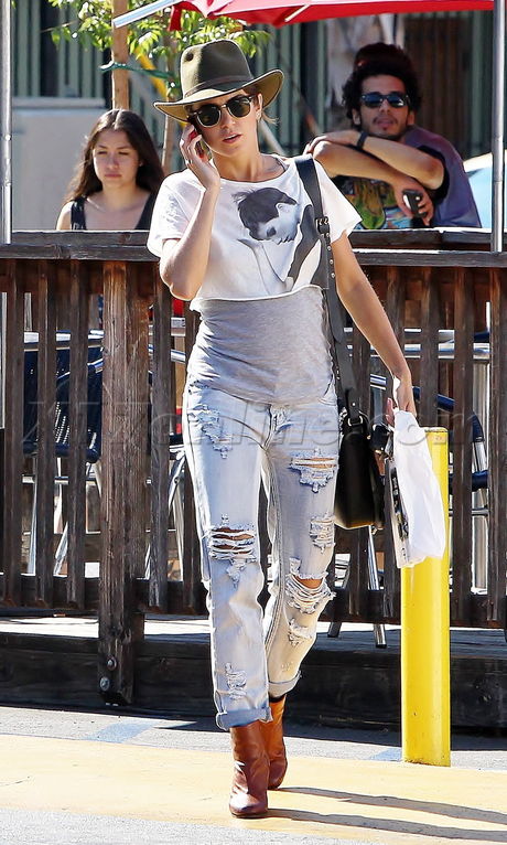 Nikki Reed hat sunglasses ripped jeans boots 