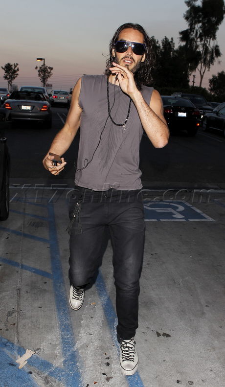 Russell Brand tattoo range rover jeans handicapped