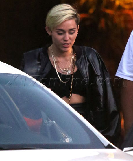 Miley Cyrus short shorts sweatshirt