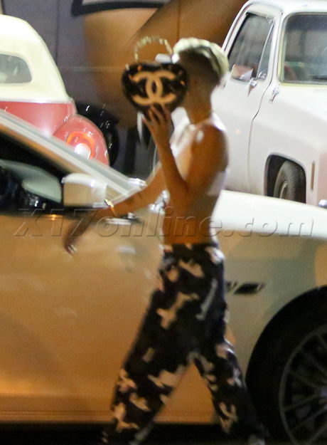 sportsbra camo tummy thin tone Miley Cyrus chanel high voltage tattoo 