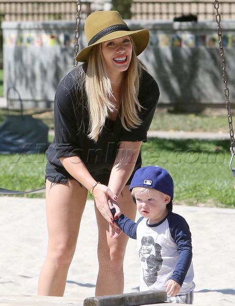 Hilary Duff blonde disney park Mike Comrie baby luca 
