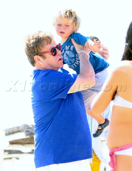 English Celebrities Saint Tropez Club 55 Elton John Elijah Zachary france vacation holiday singer musician ocean 