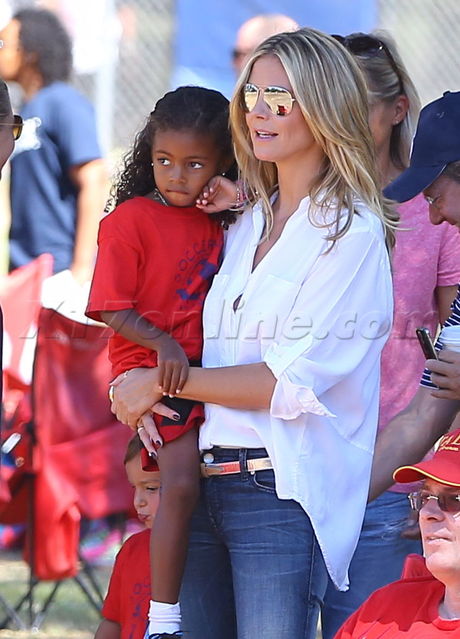 sunglasses Heidi Klum hugging Martin Kristen soccer white shirt Isabel Marant 