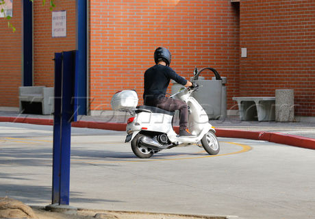 Chris Martin vespa license Gwyneth paltrow dmv santa monica helmet