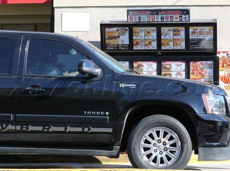 Fergie Josh Duhamel carls jr drive through drive-thru car shots suv 