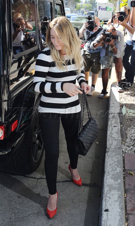 Hilary Duff black and white stripes red heels striped sweater